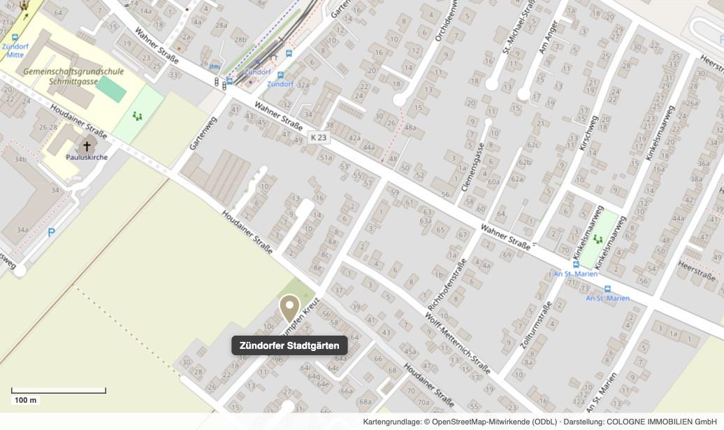 Karte der unmittelbaren Umgebung: Lage der Zündorfer Stadtgärten zwischen Wahner Straße und Houdainer Straße, mit Grundschule, Pauluskirche und Haltestellen im Umfeld.